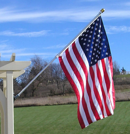 American flag and flagpole kit hanging outside