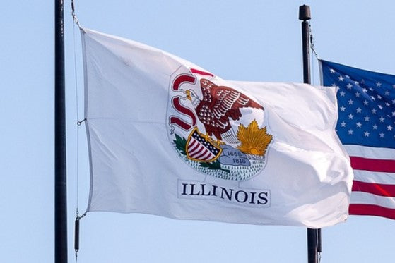 The flag of Illinois on a flagpole.